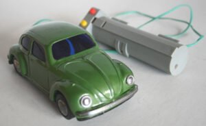 Takatoku T.T Japan 60’s Volkswagen with hand control battery operated original tin toy car