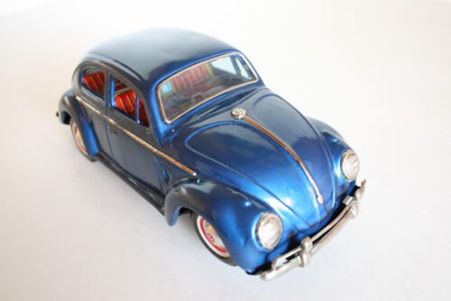 Yoshiya KO Japan 60’s battery operated tin Volkswagen Beetle with red visible engine with light, original tin toy car